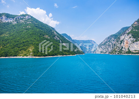 Landscape view of big lake between mountains at summer day 101040213