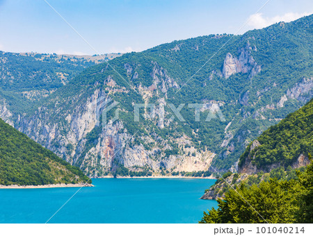 Landscape view of big lake between mountains at summer day 101040214