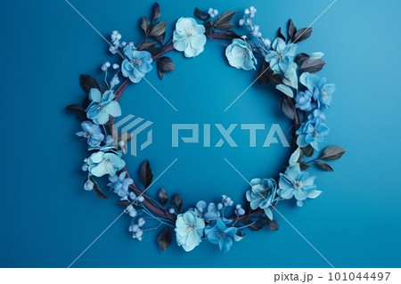 Beautiful blue background with flowers and copy space. Empty space for text. Frame, backdrop. Summer, spring, blossom. Woman's or Mother's Day, Birthday. Generative AI. 101044497