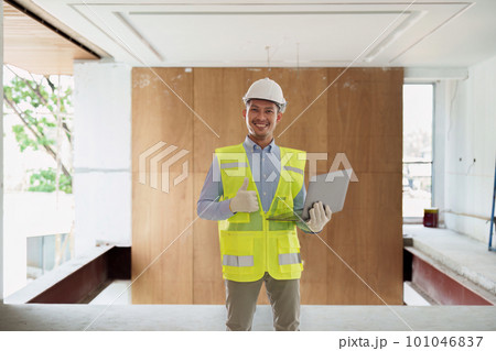 Asian Engineer working and quality check at construction site. Asian foreman construction standing at construction office 101046837