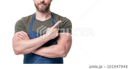 cropped view of man in apron isolated on white background. point finger cropped view of man in apron isolated on white background. point finger 101047848
