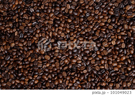 photo macro close up texture of roasted coffee beans dark, can be used as a background. photo macro close up texture of roasted coffee beans dark, can be used as a background. 101049023