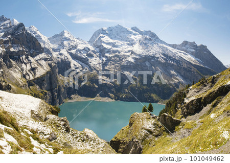Morning view of lake Oeschinensee. Swiss alps, Switzerland. Morning view of lake Oeschinensee. Swiss alps, Switzerland. 101049462