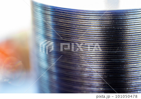 Selective focus on a sleeve of compact discs CD's used for storing electronic media. 101050478
