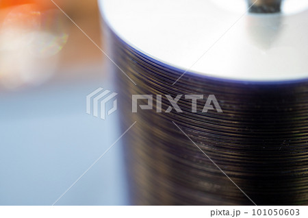 Selective focus on a sleeve of compact discs CD's used for storing electronic media. Selective focus on a sleeve of compact discs CD's used for storing electronic media. 101050603