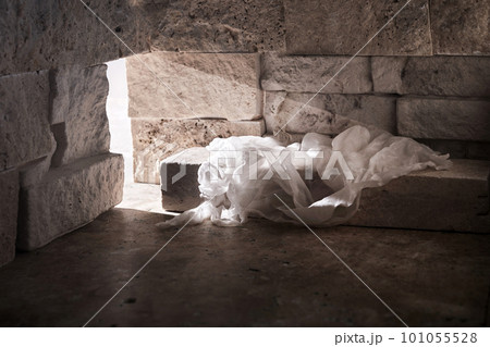 Empty tomb while light shines from the outside. Jesus Christ Resurrection. Christian Easter concept. 101055528