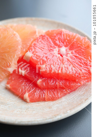 Close up of Fresh grapefruits on plate Close up of Fresh grapefruits on plate 101055661