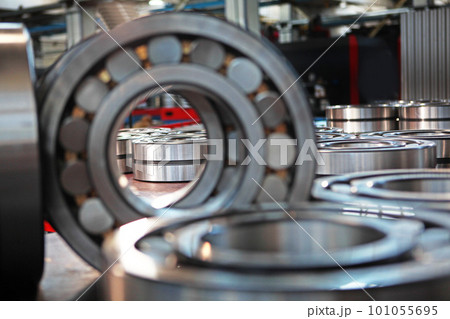 Finished products made of closed and open type bearings. The product is out of focus and the image is blurred. The concept of industry.General view of a large number of bearings.Selective focus. Finished products made of closed and open type bearings. The product is out of focus and the image is blurred. The concept of industry.General view of a large number of bearings.Selective focus. 101055695