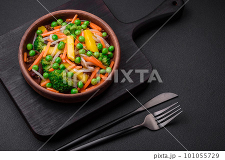 Delicious steamed vegetables broccoli, mushrooms, peas, carrots and onions Delicious steamed vegetables broccoli, mushrooms, peas, carrots and onions 101055729