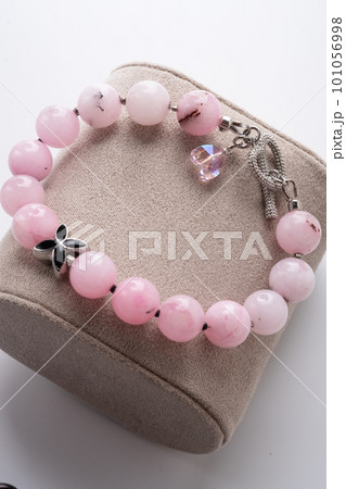 author bracelet with natural cherry jasper. fashion and jewelry concept author bracelet with natural cherry jasper. fashion and jewelry concept 101056998