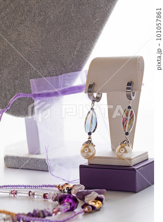 author jewelry earrins  presented on demonstrashion stand. fashion and hobby concept 101057861