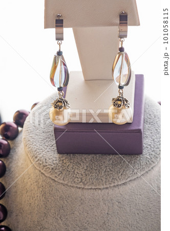 author beautiful  pearls  jewelry  demonstrated around white backround. fashion and jewelry concept 101058115