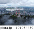 Aerial view telecommunication tower at hill top 101064430