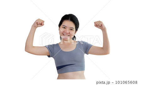 Woman flexing her muscles, Young Asian woman shows off her strength by flexing her jaw and showing off her power, Healthy, Happiness of your choice, White background. 101065608