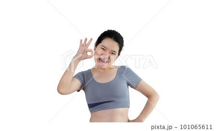 Young asian woman over white background doing ok sign with hands, OK symbol, Welcome, Agree, Join, Do as instructed, Follow orders, Acceptance of all conditions. 101065611
