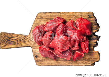 Raw organic diced lamb meat for cooking Goulash. Isolated on white background. 101069528