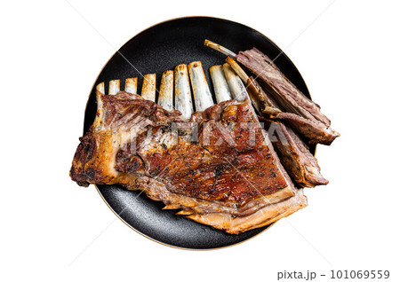 Roasted Rack of lamb ribs, mutton spareribs, sliced meat on plate. Isolated on white background. 101069559