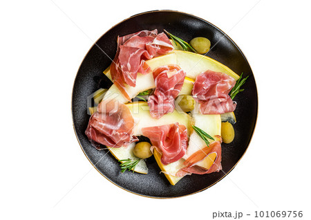 Prosciutto ham and melon salad in a plate. Isolated on white background. 101069756