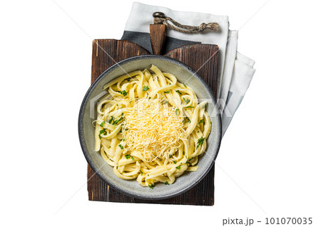 Spaetzle German egg noodles with cheese served with parsley. Isolated on white background. 101070035