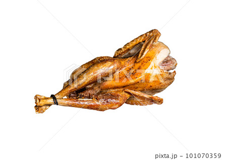 Roast guinea fowl with herbs and spices, cooked game bird. Isolated on white background. 101070359