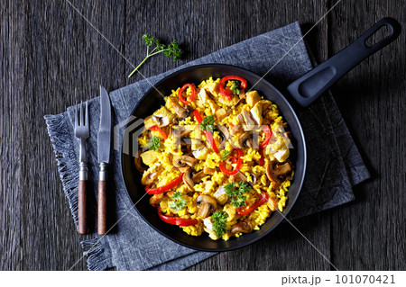 Chicken Paella with mushrooms, red pepper, spices 101070421