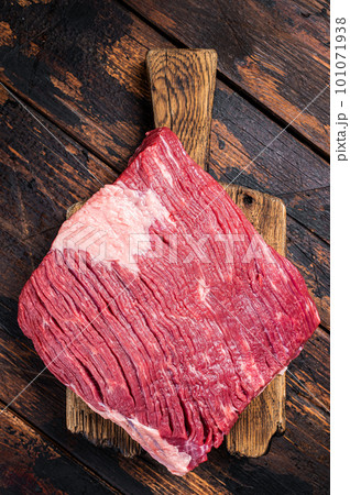Ready for cooking beef brisket, raw meat. Wooden background. Top view 101071938