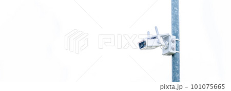 outdoor security camera on a pole. banner with copy space outdoor security camera on a pole. banner with copy space 101075665