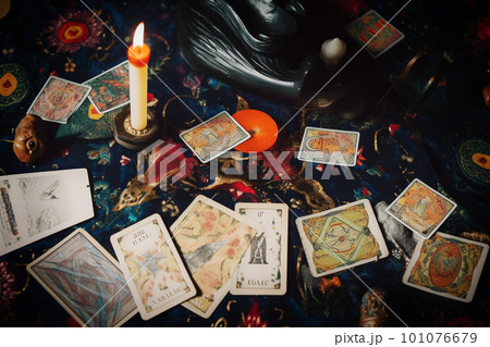 Ritual with tarot cards or fortune telling with occult and esoteric symbols. Generative AI 101076679