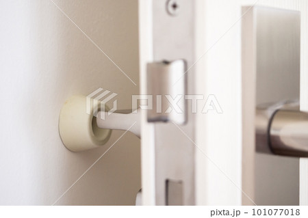 Wall mounted door stopper with modern door handle Wall mounted door stopper with modern door handle 101077018