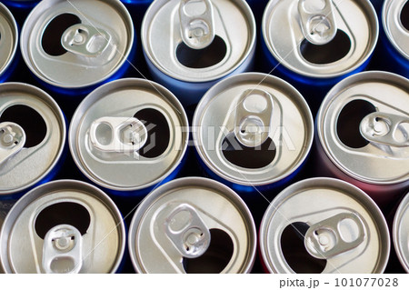 Empty aluminium drink cans recycling background concept Empty aluminium drink cans recycling background concept 101077028