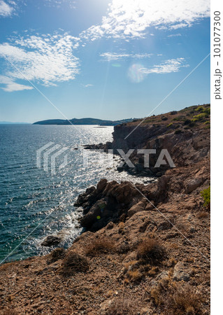 Rocky contrast cliffs, sea shore landscape, Greece 101077300