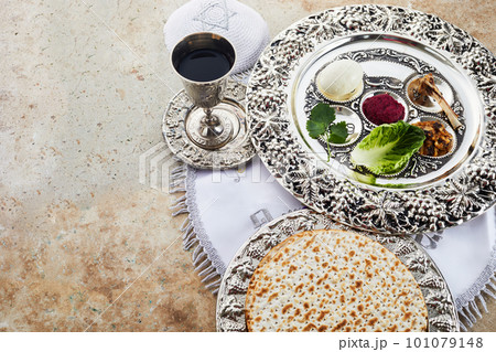 Composition with symbolic Passover, Pesach, items and meal on stone background, Composition with symbolic Passover, Pesach, items and meal on stone background, 101079148