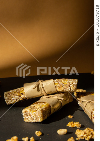 Homemade Granola energy bar. Variety of homemade protein granola breakfast bars with nuts, raisins dried cherries and chocolate. Healthy nutrition eating Gluten free cereal dieting snack super food 101079719
