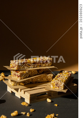Homemade Granola energy bar. Variety of homemade protein granola breakfast bars with nuts, raisins dried cherries and chocolate. Healthy nutrition eating Gluten free cereal dieting snack super food Homemade Granola energy bar. Variety of homemade protein granola breakfast bars with nuts, raisins dried cherries and chocolate. Healthy nutrition eating Gluten free cereal dieting snack super food 101080823