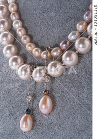 author beautiful   jewelry with pearls  demonstrated around white backround. fashion and jewelry concept 101081120