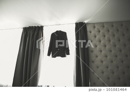Stylish groom suit in dressing room indoors Stylish groom suit in dressing room indoors 101081464