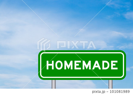 Green color transportation sign with word homemade on blue sky with white cloud background 101081989