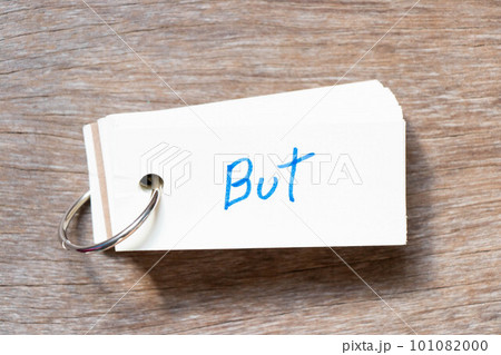 Flash card with handwriting in word but on wood background 101082000
