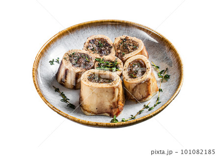 Baked marrow veal beef bones in plate with thyme and herbs. Isolated on white background. 101082185