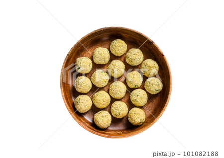 Fresh Raw falafel balls in a wooden plate. Isolated on white background. 101082188