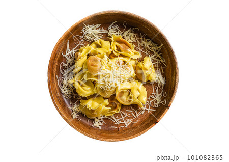 Italian ravioli Pasta with Mozzarella cheese and Tomato in wooden plate. Isolated on white background. 101082365