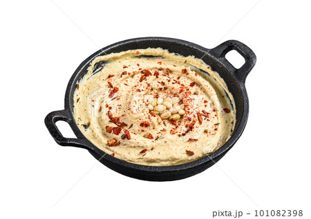 Hummus dip with chickpea in a bowl. Isolated on white background Hummus dip with chickpea in a bowl. Isolated on white background 101082398