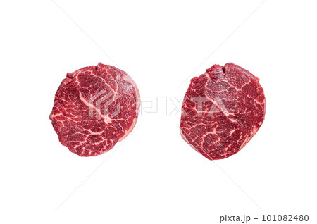 Raw fillet Mignon beef steaks on a butcher board. Isolated on white background. 101082480