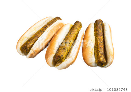 Vegan hot dog with meatless Vegetarian sausage. Isolated on white background. Vegan hot dog with meatless Vegetarian sausage. Isolated on white background. 101082743