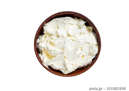 Traditional Mascarpone cheese in wooden bowl. Isolated on white background. Traditional Mascarpone cheese in wooden bowl. Isolated on white background. 101082898