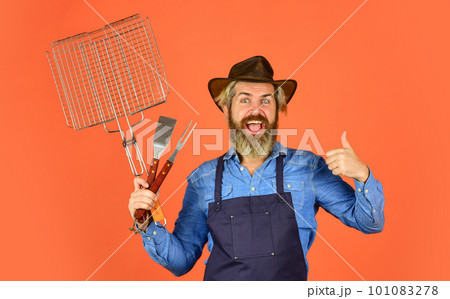 Barbeque dish. prepare dinner for family. use cooking utensils and various products. mature chef use cooking utensil for barbecue. Tools for roasting meat. Who cook better. Ultimate cooking challenge 101083278