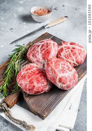 Raw Caul Fat Meatballs burger cutlets, fresh meat. Gray background. Top view 101083560