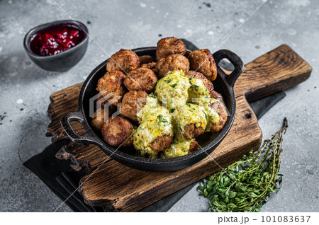 Swedish Meatballs with Cream Sauce in a skillet. Gray background. Top view 101083637