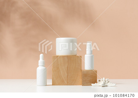 Natural background with containers for cosmetics on the wooden blocks Natural background with containers for cosmetics on the wooden blocks 101084170