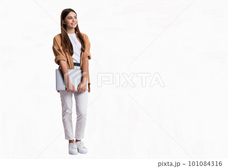 positive school girl use laptop for online education. teen girl with online school education on pc positive school girl use laptop for online education. teen girl with online school education on pc 101084316